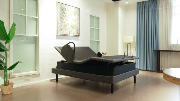 Ergomotion Ascend adjustable bed with the head raised and the foot flat - Bedplanet
