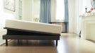 Ergomotion Ascend adjustable bed with a mattress, head end tilted up - Bedplanet