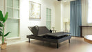 Ergomotion Ascend high-low adjustable bed with the head raised, in a bedroom - Bedplanet