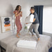Couple with the Side Cube Riser Deluxe in a bedroom