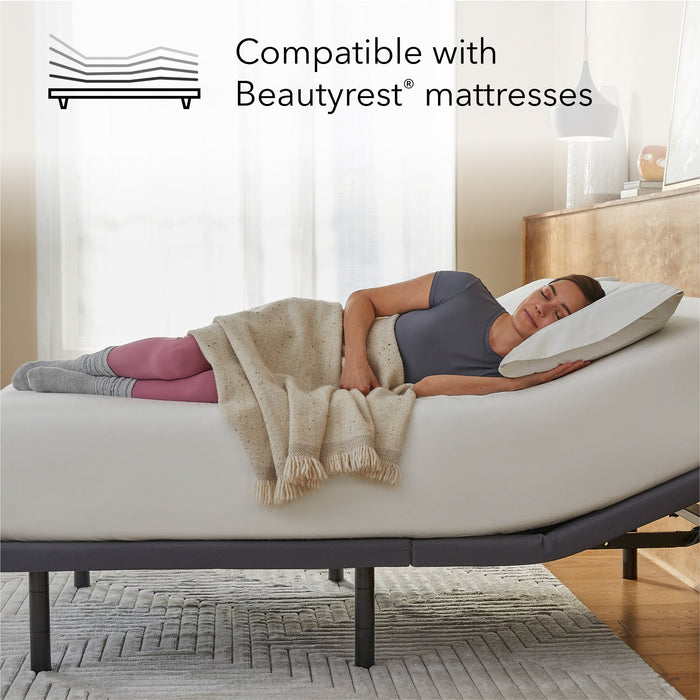 Woman sleeping on a Beautyrest mattress on the baselogic Pearl Adjustable Base
