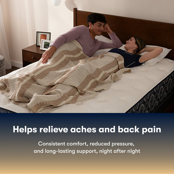 Couple relaxing on a Serta Perfect Sleeper mattress