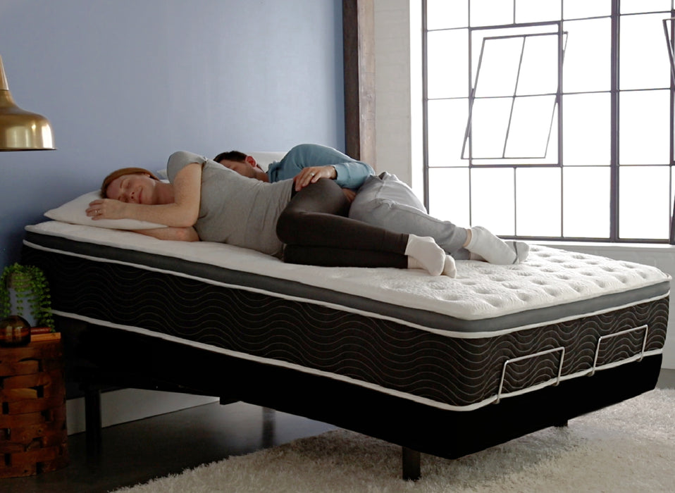 Couple sleeping in tilt position on the Ergo-Pedic iTilt Adjustable Bed in Black - Bedplanet