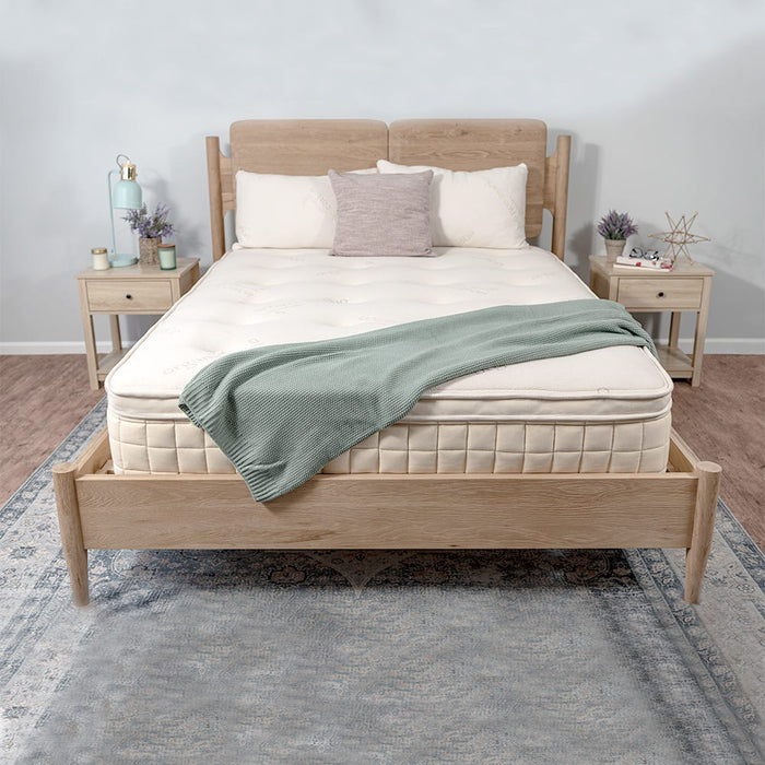 Naturepedic Concerto Pillow Top Hybrid Latex Mattress on bed frame